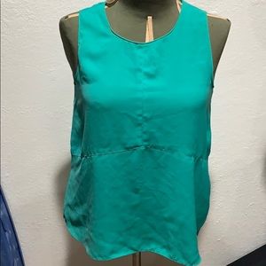 Silky teal long top wear with jeans or shorts.